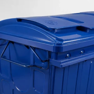 Blue Metal Waste Container Segmented Lid and Side Handle Detail Close-up of segmented lid and side handling bar on a blue metal waste container