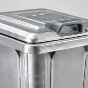Galvanized Steel Wheelie Bin Lid and Handle Detail Close-up of galvanized steel wheelie bin lid and handle detail