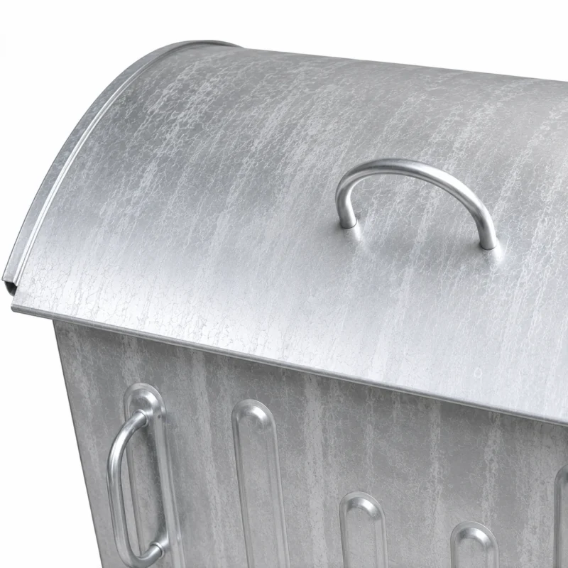 Close-up of curved lid and top handle on a metal waste container