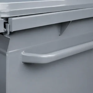 Close-up of side handle and lid hinge detail on a metal waste container