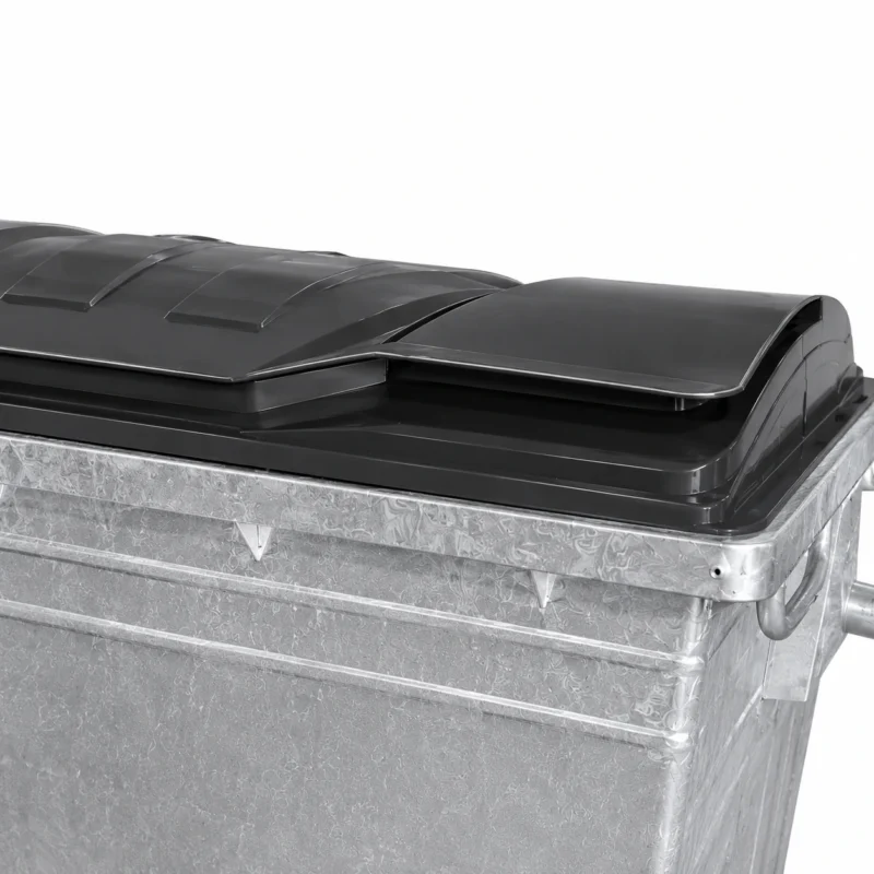 1100L Galvanized Steel Waste Container Black Lid Detail | KOVANTO Close-up detail of black plastic lid on a 1100L galvanized steel waste container
