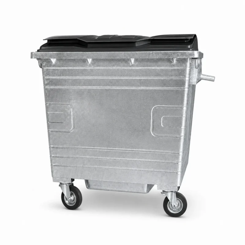 1100L Galvanized Steel Waste Container Front-Side View | KOVANTO 1100L galvanized steel waste container with black plastic lid and four caster wheels shown from a front-side view