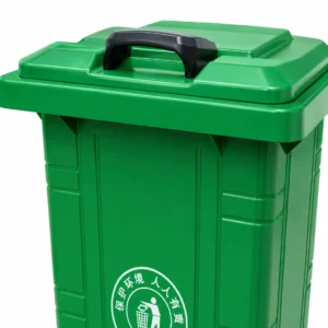 Green Plastic Wheelie Bin Lid and Handle Detail | KOVANTO Close-up of green plastic wheelie bin lid with integrated black handle
